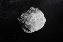 recreación artística de un asteroide en el espacio